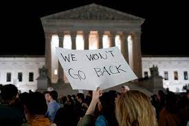 Protestors shown in front of the Supreme Court continue gathering after leaked draft